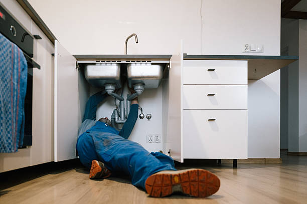 Professional Emergency Plumber technician working in Eden, WI